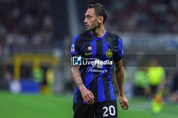 2023-08-19 - Hakan Calhanoglu of FC Internazionale looks on during Serie A 2023/24 football match between FC Internazionale and AC Monza at Giuseppe Meazza Stadium, Milan, Italy on August 19, 2023 - INTER - FC INTERNAZIONALE VS AC MONZA - ITALIAN SERIE A - SOCCER