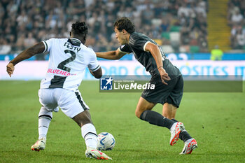 2023-08-20 - Juventus's Federico Chiesa in action against Udinese's Festy Ebosele - UDINESE CALCIO VS JUVENTUS FC - ITALIAN SERIE A - SOCCER