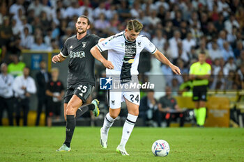 2023-08-20 - Udinese's Lazar Samardzic in action against Juventus's Adrien Rabiot - UDINESE CALCIO VS JUVENTUS FC - ITALIAN SERIE A - SOCCER