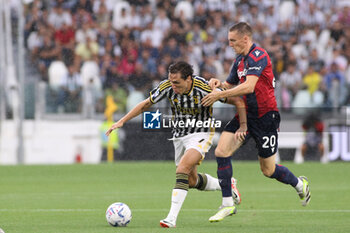 2023-08-27 - Michel Aebischer (Bologna FC) vs Federico Chiesa (Juventus FC) - JUVENTUS FC VS BOLOGNA FC - ITALIAN SERIE A - SOCCER