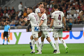 2023-08-26 - Torino Fc team celebrating Perr Schuurs after his goal - AC MILAN VS TORINO FC - ITALIAN SERIE A - SOCCER