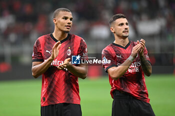 2023-08-26 - Malick Thiaw and Rade Krunic (AC Milan) greets supporters - AC MILAN VS TORINO FC - ITALIAN SERIE A - SOCCER