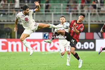 2023-08-26 - Ricardo Rodriguez (Torino Fc) in action against Tijjani Reijnders (Ac Milan) - AC MILAN VS TORINO FC - ITALIAN SERIE A - SOCCER