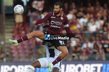 2023-08-28 - Antonio Candreva of US Salernitana 1919 competes for the ball with Christian Kabasele of Udinese Calcio during Serie A between US Salernitana 1919 vs Udinese Calcio at Arechi Stadium - US SALERNITANA VS UDINESE CALCIO - ITALIAN SERIE A - SOCCER