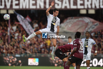 2023-08-28 - Florian Thauvin of Udinese Calcio competes for the ball with Lassana Coulibaly of US Salernitana 1919 during Serie A between US Salernitana 1919 vs Udinese Calcio at Arechi Stadium - US SALERNITANA VS UDINESE CALCIO - ITALIAN SERIE A - SOCCER