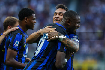2023-09-03 - Marcus Thuram of FC Internazionale celebrates after scoring a goal with Lautaro Martinez of FC Internazionale during Serie A 2023/24 football match between FC Internazionale and ACF Fiorentina at Giuseppe Meazza Stadium, Milan, Italy on September 03, 2023 - INTER - FC INTERNAZIONALE VS ACF FIORENTINA - ITALIAN SERIE A - SOCCER