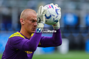 2023-09-03 - Oliver Christensen of ACF Fiorentina warms up during Serie A 2023/24 football match between FC Internazionale and ACF Fiorentina at Giuseppe Meazza Stadium, Milan, Italy on September 03, 2023 - INTER - FC INTERNAZIONALE VS ACF FIORENTINA - ITALIAN SERIE A - SOCCER