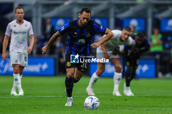 2023-09-03 - Hakan Calhanoglu of FC Internazionale kickis penalty during Serie A 2023/24 football match between FC Internazionale and ACF Fiorentina at Giuseppe Meazza Stadium, Milan, Italy on September 03, 2023 - INTER - FC INTERNAZIONALE VS ACF FIORENTINA - ITALIAN SERIE A - SOCCER