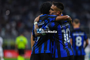 2023-09-03 - Lautaro Martinez of FC Internazionale celebrates after scoring a goal with Juan Cuadrado of FC Internazionale during Serie A 2023/24 football match between FC Internazionale and ACF Fiorentina at Giuseppe Meazza Stadium, Milan, Italy on September 03, 2023 - INTER - FC INTERNAZIONALE VS ACF FIORENTINA - ITALIAN SERIE A - SOCCER