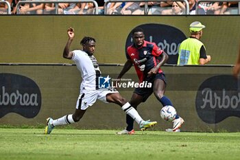 2023-09-17 - Hassane Kamara of Udinese Calcio. Zito Luvumbo of Cagliari Calcio - CAGLIARI CALCIO VS UDINESE CALCIO - ITALIAN SERIE A - SOCCER