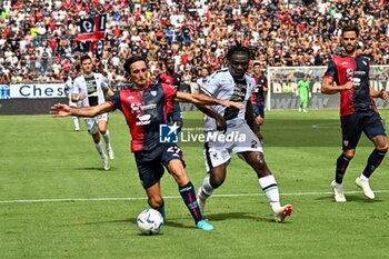2023-09-17 - Tommaso Augello of Cagliari Calcio, Festy Ebosele of Udinese Calcio - CAGLIARI CALCIO VS UDINESE CALCIO - ITALIAN SERIE A - SOCCER