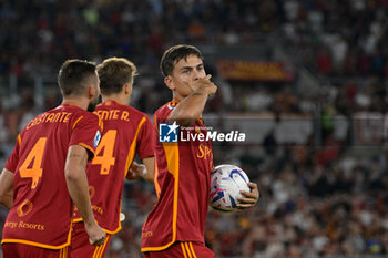 2023-09-17 - Paulo Dybala (AS Roma); celebrates after scoring the goal 1-0 during the Italian Football Championship League A 2023/2024 match between AS Roma vs Empoli FC at the Olimpic Stadium in Rome  on 17 September  2023. - AS ROMA VS EMPOLI FC - ITALIAN SERIE A - SOCCER