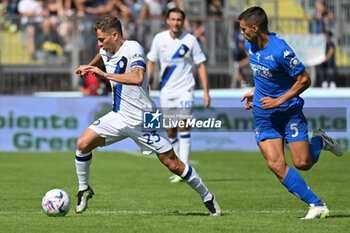 2023-09-24 - Inter - FC Internazionale's Nicolo Barella against Empoli FC's midfielder Alberto Grassi - EMPOLI FC VS INTER - FC INTERNAZIONALE - ITALIAN SERIE A - SOCCER