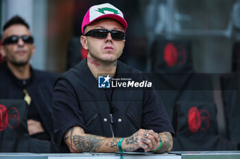 2023-09-23 - Jacopo Lazzarini known as Lazza Italian Rapper and Record producer looks on during Serie A 2023/24 football match between AC Milan and Hellas Verona FC at San Siro Stadium, Milan, Italy on September 23, 2023 - AC MILAN VS HELLAS VERONA FC - ITALIAN SERIE A - SOCCER