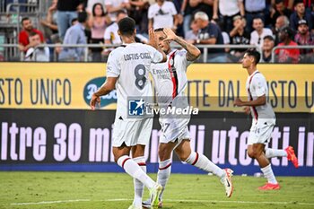 2023-09-27 - Noah Okafor of AC Milan, Esultanza, Joy After scoring goal, - CAGLIARI CALCIO VS AC MILAN - ITALIAN SERIE A - SOCCER