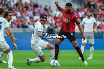 2023-09-30 - Ruben Loftus-Cheek of AC Milan competes for the ball with Alessio Romagnoli of SS Lazio during Serie A 2023/24 football match between AC Milan and SS Lazio at San Siro Stadium, Milan, Italy on September 30, 2023 - AC MILAN VS SS LAZIO - ITALIAN SERIE A - SOCCER