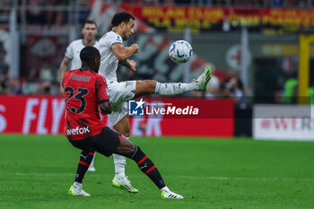 2023-09-30 - Felipe Anderson of SS Lazio competes for the ball with Fikayo Tomori of AC Milan during Serie A 2023/24 football match between AC Milan and SS Lazio at San Siro Stadium, Milan, Italy on September 30, 2023 - AC MILAN VS SS LAZIO - ITALIAN SERIE A - SOCCER