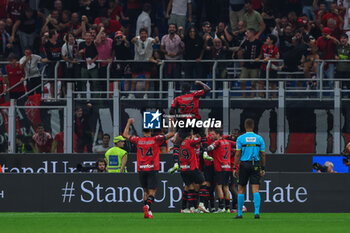 2023-09-30 - Christian Pulisic of AC Milan celebrates with his teammates after scoring a goal during Serie A 2023/24 football match between AC Milan and SS Lazio at San Siro Stadium, Milan, Italy on September 30, 2023 - AC MILAN VS SS LAZIO - ITALIAN SERIE A - SOCCER
