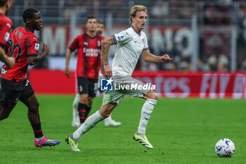 2023-09-30 - Nicolo Rovella of SS Lazio seen in action during Serie A 2023/24 football match between AC Milan and SS Lazio at San Siro Stadium, Milan, Italy on September 30, 2023 - AC MILAN VS SS LAZIO - ITALIAN SERIE A - SOCCER