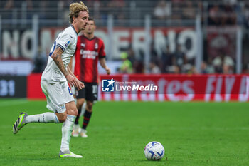 2023-09-30 - Nicolo Rovella of SS Lazio seen in action during Serie A 2023/24 football match between AC Milan and SS Lazio at San Siro Stadium, Milan, Italy on September 30, 2023 - AC MILAN VS SS LAZIO - ITALIAN SERIE A - SOCCER