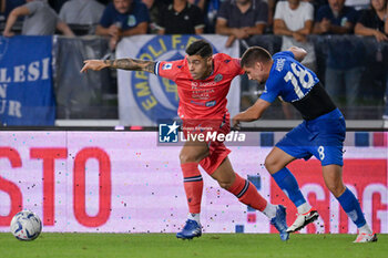 2023-10-06 - Udinese Calcio's midfielder Martin Ismael Payero against Empoli FC's midfielder Razvan Marin - EMPOLI FC VS UDINESE CALCIO - ITALIAN SERIE A - SOCCER