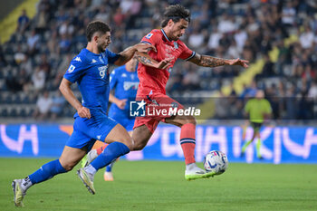 2023-10-06 - Udinese Calcio's defender Joao Diogo Fonseca Ferreira against Empoli FC's defender Liberato Cacace - EMPOLI FC VS UDINESE CALCIO - ITALIAN SERIE A - SOCCER