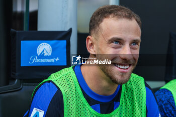 2023-10-07 - Carlos Augusto of FC Internazionale smiling during Serie A 2023/24 football match between FC Internazionale and Bologna FC at Giuseppe Meazza Stadium, Milan, Italy on October 07, 2023 - INTER - FC INTERNAZIONALE VS BOLOGNA FC - ITALIAN SERIE A - SOCCER