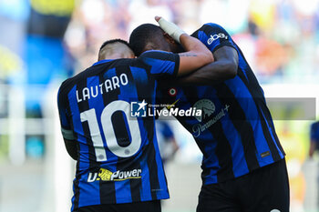 2023-10-07 - Lautaro Martinez of FC Internazionale celebrates after scoring a goal with Marcus Thuram of FC Internazionale during Serie A 2023/24 football match between FC Internazionale and Bologna FC at Giuseppe Meazza Stadium, Milan, Italy on October 07, 2023 - INTER - FC INTERNAZIONALE VS BOLOGNA FC - ITALIAN SERIE A - SOCCER