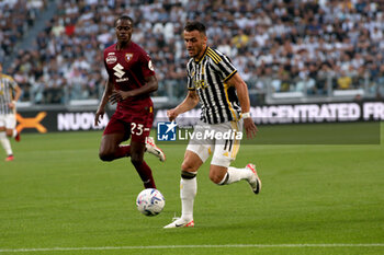 2023-10-07 - Filip Kostic (Juventus FC) in action - JUVENTUS FC VS TORINO FC - ITALIAN SERIE A - SOCCER