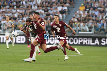2023-10-07 - Raoul Bellanova (Torino FC) vs Adrien Rabiot (Juventus FC) - JUVENTUS FC VS TORINO FC - ITALIAN SERIE A - SOCCER