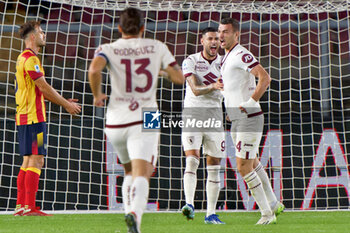 2023-10-28 - Alessandro Buongiorno of Torino FC celebrates after scoring a goal with Antonio Sanabria of Torino FC - US LECCE VS TORINO FC - ITALIAN SERIE A - SOCCER