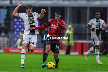 2023-11-04 - Tijjani Reijnders of AC Milan competes for the ball with Lazar Samardzic of Udinese Calcio during Serie A 2023/24 football match between AC Milan and Udinese Calcio at San Siro Stadium, Milan, Italy on November 04, 2023 - AC MILAN VS UDINESE CALCIO - ITALIAN SERIE A - SOCCER