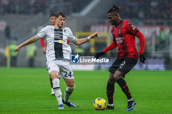 2023-11-04 - Rafael Leao of AC Milan competes for the ball with Lazar Samardzic of Udinese Calcio during Serie A 2023/24 football match between AC Milan and Udinese Calcio at San Siro Stadium, Milan, Italy on November 04, 2023 - AC MILAN VS UDINESE CALCIO - ITALIAN SERIE A - SOCCER