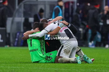 2023-11-04 - Marco Silvestri of Udinese Calcio celebrates the victory at the end of the match with Roberto Maximiliano Pereyra of Udinese Calcio during Serie A 2023/24 football match between AC Milan and Udinese Calcio at San Siro Stadium, Milan, Italy on November 04, 2023 - AC MILAN VS UDINESE CALCIO - ITALIAN SERIE A - SOCCER