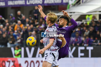 2023-11-12 - Fiorentina's Nicolas Gonzalez hampered by Bologna's Victor Kristiansen - ACF FIORENTINA VS BOLOGNA FC - ITALIAN SERIE A - SOCCER
