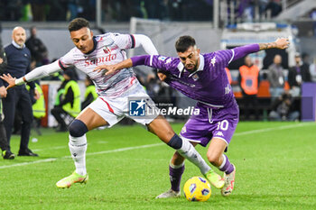 2023-11-12 - Fiorentina's Nicolas Gonzalez fights for the ball against Bologna's Dan Nove - ACF FIORENTINA VS BOLOGNA FC - ITALIAN SERIE A - SOCCER