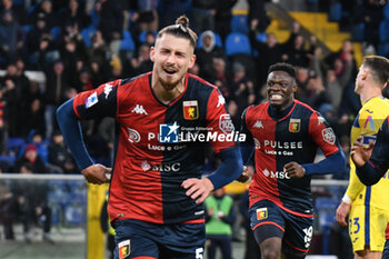 2023-11-10 - Radu Dragusin celebrates scoring his team's first goal to make the score 1-0 during Italian Serie A between Genoa CFC and Hellas Verona at Stadio Luigi Ferraris, Genova - GENOA CFC VS HELLAS VERONA FC - ITALIAN SERIE A - SOCCER