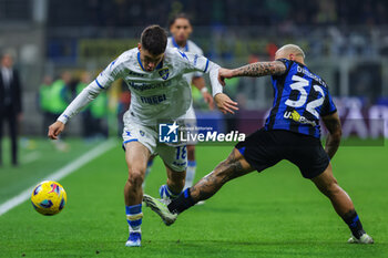 2023-11-12 - Matias Soule of Frosinone Calcio competes for the ball with Federico Dimarco of FC Internazionale during Serie A 2023/24 football match between FC Internazionale and Frosinone Calcio at Giuseppe Meazza Stadium, Milan, Italy on November 12, 2023 - INTER - FC INTERNAZIONALE VS FROSINONE CALCIO - ITALIAN SERIE A - SOCCER