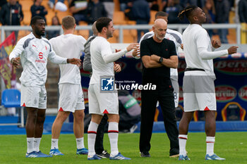 2023-11-11 - Players of AC Milan warms up with coach Stefano Pioli of AC Milan - US LECCE VS AC MILAN - ITALIAN SERIE A - SOCCER