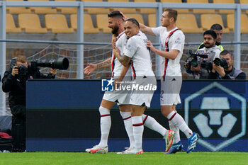 2023-11-11 - Olivier Giroud of AC Milan celebrates after scoring a goal with teammates - US LECCE VS AC MILAN - ITALIAN SERIE A - SOCCER