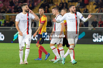2023-11-11 - Olivier Giroud of AC Milan and Theo Hernandez of AC Milan protests - US LECCE VS AC MILAN - ITALIAN SERIE A - SOCCER