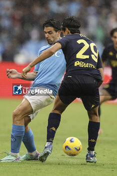 2023-11-12 - Empoli's Italian midfielder Youssef Maleh challenges for the ball with SSC Napoli's Argentine forward Giovanni Simeone during the Serie A football match between SSC Napoli and Empoli at the Diego Armando Maradona Stadium in Naples, southern Italy, on November 12, 2023. - SSC NAPOLI VS EMPOLI FC - ITALIAN SERIE A - SOCCER
