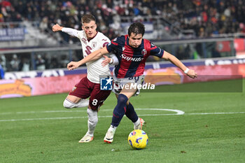 2023-11-27 - Giovanni Fabbian (Bologna Fc) against Ivan Ilic (Torino Fc) - BOLOGNA FC VS TORINO FC - ITALIAN SERIE A - SOCCER