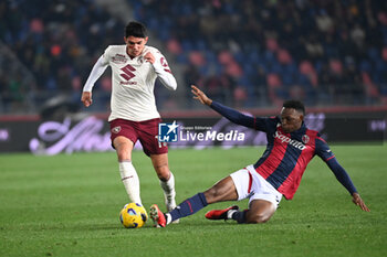 2023-11-27 - Jhon Lucumi (Bologna Fc) in action on Raoul Bellanova (Torino Fc) - BOLOGNA FC VS TORINO FC - ITALIAN SERIE A - SOCCER