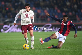 2023-11-27 - Jhon Lucumi (Bologna Fc) in action on Raoul Bellanova (Torino Fc) - BOLOGNA FC VS TORINO FC - ITALIAN SERIE A - SOCCER