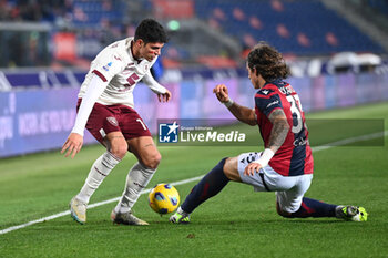 2023-11-27 - Riccardo Calafiori (Bologna Fc) in action on Raoul Bellanova (Torino Fc) - BOLOGNA FC VS TORINO FC - ITALIAN SERIE A - SOCCER