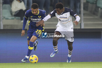 2023-11-27 - Cyril Ngonge of Hellas Verona FC battle for the ball with Patrick Dorgu of US Lecce  during Hellas Verona FC  vs US Lecce, 13° Serie A Tim 2023-24 game at Marcantonio Bentegodi Stadium in Verona (VR), Italy, on November 27, 2023. - HELLAS VERONA FC VS US LECCE - ITALIAN SERIE A - SOCCER