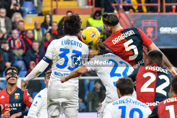 2023-12-02 - Aerial contrast during Serie A TIM match between Genoa CFC and Empoli FC at Stadio Luigi Ferraris, Genoa - GENOA CFC VS EMPOLI FC - ITALIAN SERIE A - SOCCER