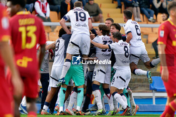 2023-12-03 - Charalampos Lykogiannis of Bologna FC celebrates after scoring a goal with teammates - US LECCE VS BOLOGNA FC - ITALIAN SERIE A - SOCCER