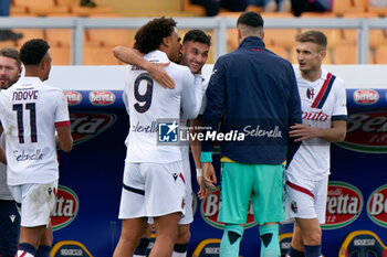 2023-12-03 - Charalampos Lykogiannis of Bologna FC celebrates after scoring a goal with Joshua Zirkzee of Bologna FC - US LECCE VS BOLOGNA FC - ITALIAN SERIE A - SOCCER